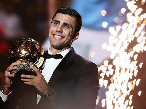 Manchester City's Spanish midfielder Rodri receives the men's Ballon d'Or award during the award ceremony in Paris on Monday night.