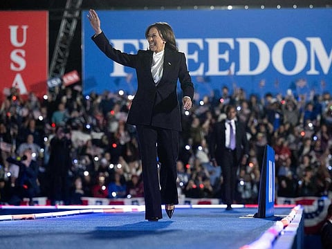 US Vice President and Democratic presidential candidate Kamala Harris waves as she arrives onstage to speak on The Ellipse just south of the White House in Washington, DC, on October 29, 2024.