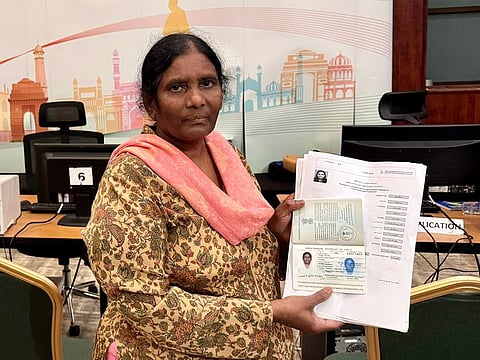 Eada Ratna Kumari shows her documents when she visited the Indian Consulate in Dubai on Tuesday