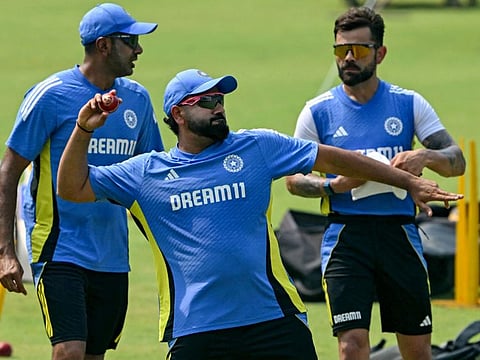 India's captain Rohit Sharma (centre) takes part in a fielding training along with teammates Ravichandran Ashwin (left) and Virat Kohli in Mumbai on Wednesday.