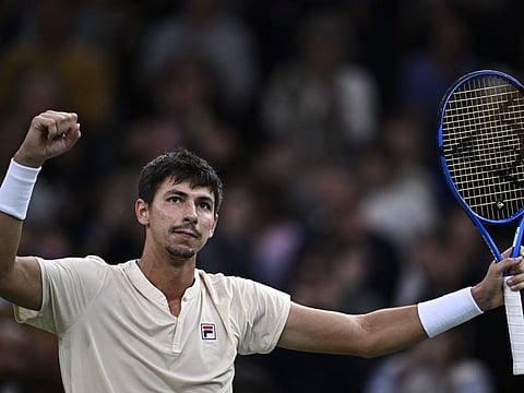 Australia's Alexei Popyrin celebrates after winning against Russia's Daniil Medvedev on day three of the Paris ATP Masters.