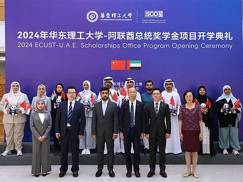 UAE and CHinese officials standing for a photograph The Scholarship Office (SCO) of the Presidential Court announced an increase in Emirati students studying in the People’s Republic of China