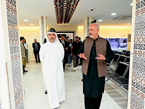 Faisal Niaz Tirmizi, Pakistan’s Ambassador to the UAE, and Rashed Al Ansari, CEO of Al Ansari Exchange, during the inauguration of of expanded consular halls.