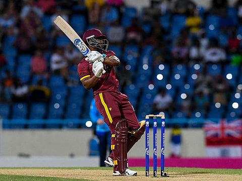 Evin Lewis of West Indies hits six during the first ODI against England in Antigua and Barbuda on Thursday.