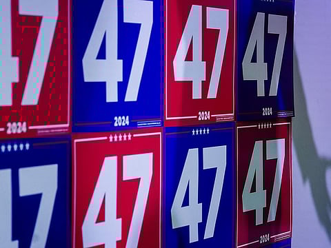 The shadow of Republican Florida Congressman Byron Donalds, surrogate for former president Donald Trump, is seen as he speaks during a campaign event on October 31, 2024, in Atlanta, Georgia.