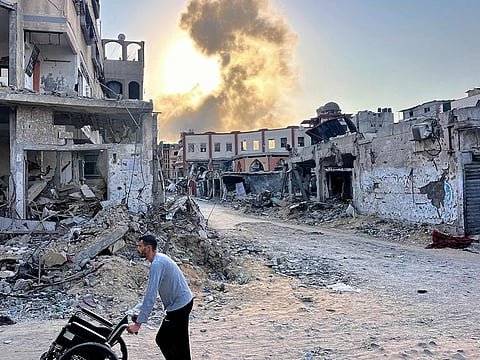 Smoke rises following an Israeli bombardment in Beit Lahia in the northern Gaza Strip.