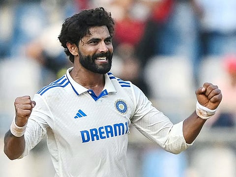 India's Ravindra Jadeja celebrates after taking the wicket of New Zealand's Matt Henry during the second day of the third and final Test match at Wankhede Stadium in Mumbai on November 2, 2024.