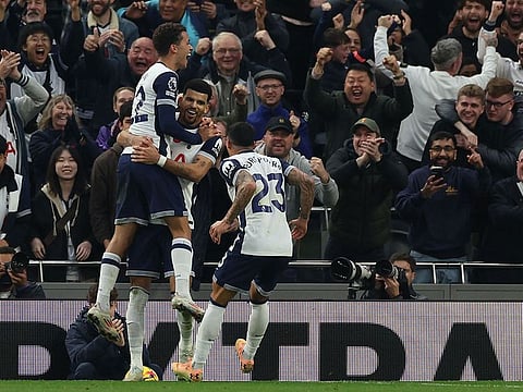 Tottenham Hotspur's English striker #19 Dominic Solanke (C) celebrates with Tottenham Hotspur's Welsh striker #22 Brennan Johnson (L) and Tottenham Hotspur's Spanish defender #23 Pedro Porro (R) after scoring their second goal during the English Premier League football match between Tottenham Hotspur and Aston Villa at the Tottenham Hotspur Stadium in London.