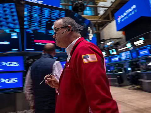 Traders work the floor of the New York Stock Exchange.