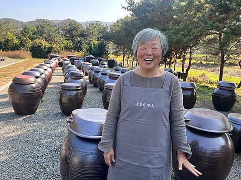 At 69, Master Kubonil embodies the rich tapestry of Korean culinary heritage, dedicated to the age-old craft of traditional soy sauce and fermented condiments.