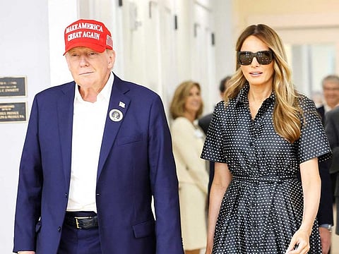 Republican presidential nominee former President Donald Trump and his wife Melania Trump depart after casting their votes at a polling place in the Morton and Barbara Mandel Recreation Center on Election Day, on November 05, 2024 in Palm Beach, Florida.