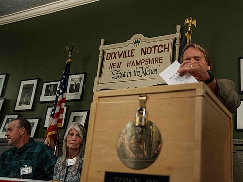 Les Otten casts the first of six ballots after the polls open on November 5, 2024 in Dixville Notch, New Hampshire. Americans cast their ballots today in the presidential race between Republican nominee former President Donald Trump and Democratic nominee Vice President Kamala Harris, as well as multiple state elections that will determine the balance of power in Congress.