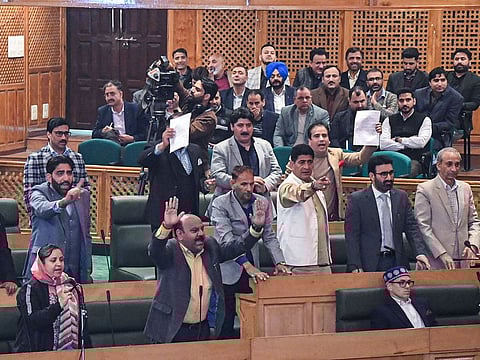 Jammu & Kashmir Deputy Chief Minister and National Conference MLA Surinder Kumar Choudhary with party MLAs during passing of the resolution in Srinagar on November 6, 2024.