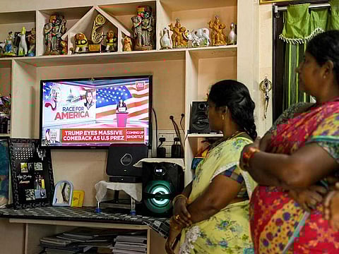 Villagers watch the 2024 US presidential election poll results inside a house in Vadluru, the ancestral village of Usha Vance's parents.