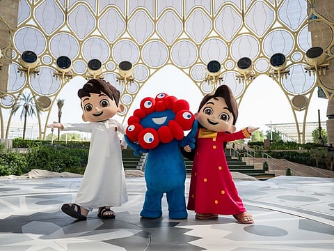 Expo 2020 Dubai mascots Rashid and Latifa receive Expo 2025 Osaka mascot Myaku-Myaku at Expo City Dubai on Thursday