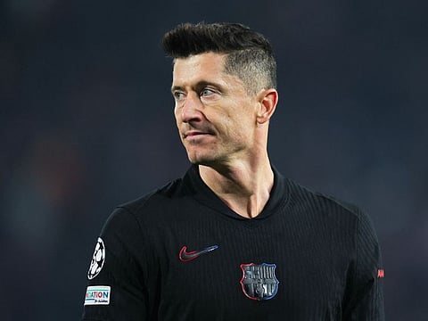 Striker Robert Lewandowski showcased his skills to score two goals against Red Star Belgrade and take Barcelona to the top half of the Uefa Champions League on Wednesday.