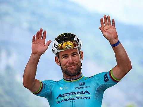 Astana Qazaqstan Team's British rider Mark Cavendish waves as he awaits the start of the 5th stage of the 111th edition of the Tour de France cycling race, 177,5 km between Saint-Jean-de-Maurienne and Saint-Vulbas, on July 3, 2024.