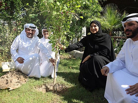 Dr Amna bint Abdullah Al Dahak, Minister of Climate Change and Environment, and other officials during the launch event of the million seedlings at Gracia Farm in Abu Dhabi