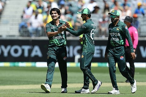 Pakistans Mohammad Hasnain (left) celebrates getting the wicket of Australias Adam Zampa during the third One-Day International cricket match at the Perth Stadium on Sunday.
