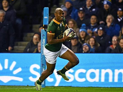 South Africa's wing Makazole Mapimpi runs in his second try during the Autumn Nations Series International rugby union test match between Scotland and South Africa at Murrayfield Stadium in Edinburgh on Sunday.