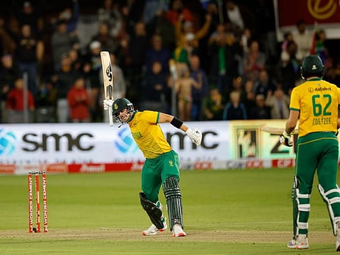 South Africa's Tristan Stubbs celebrates scoring the winning runs as South Africa's Gerald Coetzee looks on during the second T20 international cricket match against India at St Georges Park in Gqeberha on Sunday.