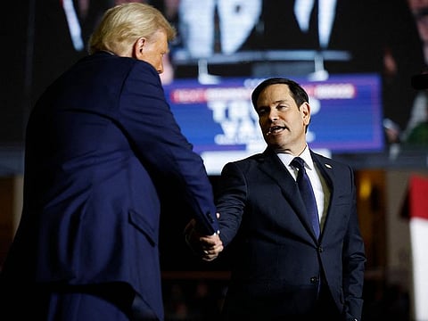 US Sen. Marco Rubio (R-FL) shakes hands with Republican presidential nominee, former President Donald Trump at a campaign rally at The PPL Center on October 29, 2024 in Allentown, Pennsylvania.