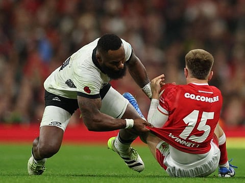 Fiji's wing Semi Radradra (left) receives a yellow card for this tackle on Wales' full-back Cameron Winnett during the Autumn Nations Series International rugby union test match at the Principality Stadium, in Cardiff on November 10.