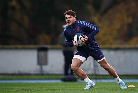 France's scrum-half Antoine Dupont takes part in a training session in Marcoussis, south of Paris, on Tuesday.