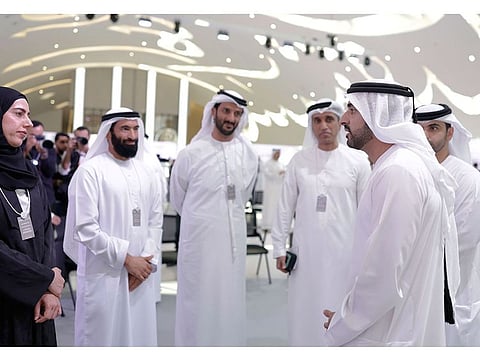 Sheikh Hamdan and Sheikh Mansoor speaking to the attendees of the Dubai Sports Retreat at the Museum of the Future on Tuesday.