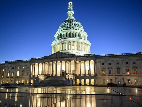 The US Capitol is seen at dusk in Washington
