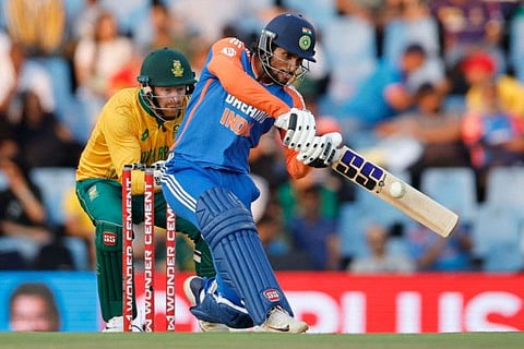 India's Tilak Varma in action as South Africa's wicketkeeper Heinrich Klaasen reacts during the third T20 international cricket match at SuperSport Park in Centurion on Wednesday.