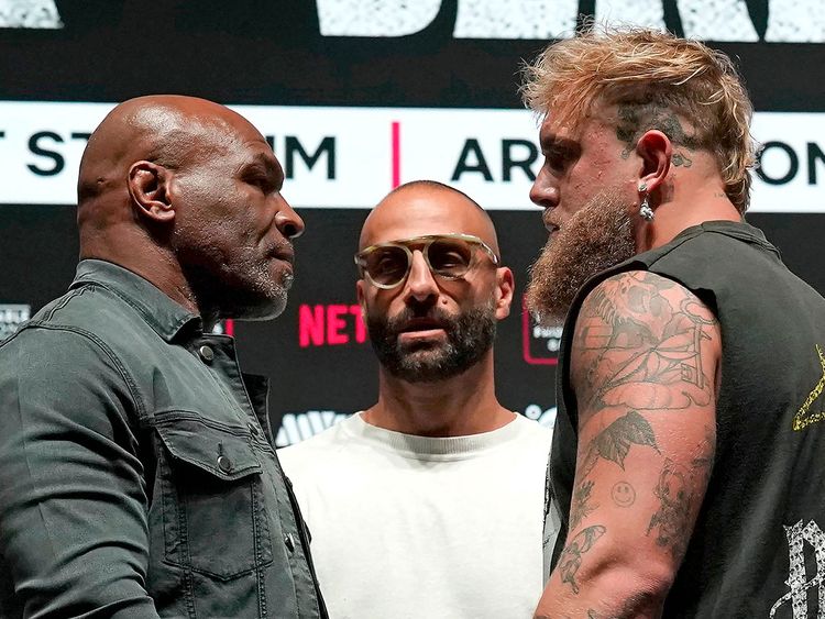 US boxer Mike Tyson (L) and US boxer-actor Jake Paul (R) face each other during a press conference ahead of their heavyweight bout at The Pavilion at Toyota Music Factory in Irving, Texas.