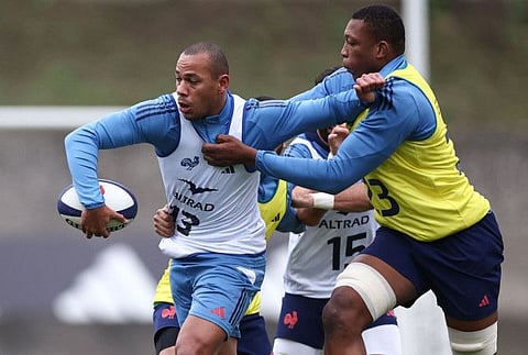 France's centre Gael Fickou (left) and lock Cameron Woki take part in a training session in Marcoussis, south of Paris, on Wednesday.