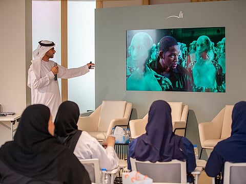 Major Dr Essa Basaeed talking at Sharjah International Book Fair's session about advanced techniques to convert information into actionable knowledge