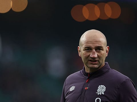 England's head coach Steve Borthwick watches his players warm up at the Allianz Stadium in Twickenham.
