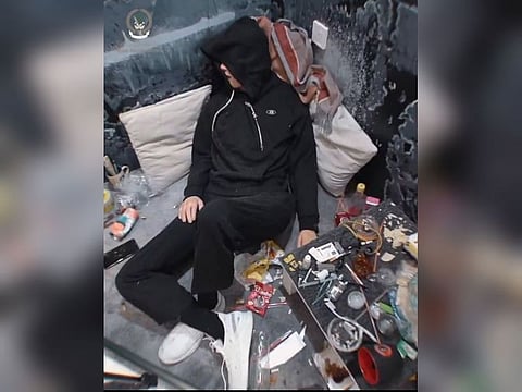 A still from the police video of a room, which displays different types of drugs and explains the harms of addiction.
