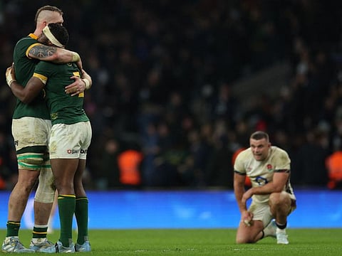 South Africa's RG Snyman and Siya Kolisi celebrate their win at the Autumn Nations Series International Rugby Union match against England at Allianz Stadium, Twickenham in south-west London, on Saturday.
