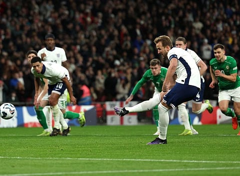 England's striker Harry Kane shoots from the penalty spot to score the team's first goal during the Uefa Nations League, League B - Group 2, football match against the Republic of Ireland at Wembley Stadium in London on Sunday.