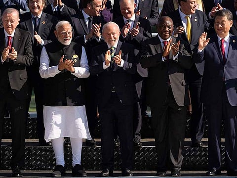 From left to right: Turkish President Recep Tayyip Erdogan, Indian Prime Minister Narendra Modi, Brazilian President Luiz Inacio Lula da Silva, South African President Cyril Ramaphosa, and Chinese President Xi Jinping join G20 leaders for a group photo at the G20 Summit in Rio de Janeiro, Brazil, on November 18, 2024.