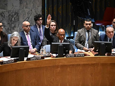 US Alternate Ambassador to the United Nations Robert Wood raises his hand to veto a draft resolution calling for a ceasefire in Gaza, during a United Nations Security Council meeting to discuss the situation in the Middle East on November 20, 2024, at UN headquarters in New York City.