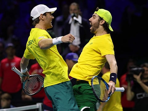 Matthew Ebden (left) and Jordan Thompson of Team Australia celebrate beating Tommy Paul and Ben Shelton of Team USA during their quarter-final doubles match at the Davis Cup Finals at the Palacio de Deportes Jose Maria Martin Carpena arena in Malaga, southern Spain, on Thursday.