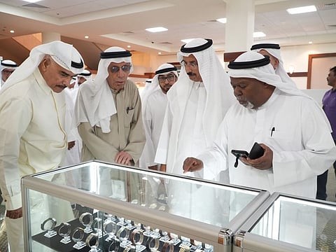 Mohammed Ahmed Al Murr (2nd from R) opens the “UAE Hobbies and Personal Collections” exhibition in Dubai