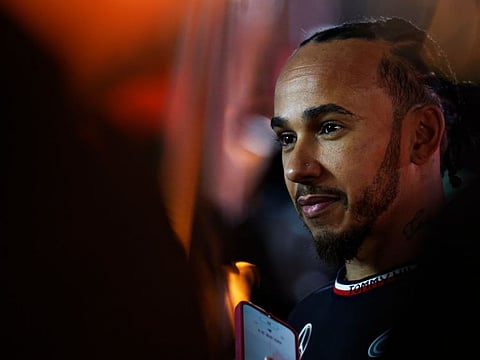 Lewis Hamilton of Mercedes looks on in the Paddock after practice, ahead of the F1 Grand Prix of Las Vegas on Thursday.
