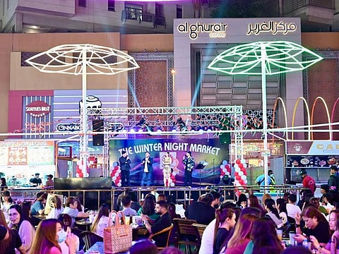 Filipino OFWs enjoy delicious food and live music at Dubai's night markets.