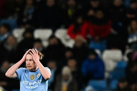 Manchester City's Belgian midfielder Kevin De Bruyne reacts during the English Premier League football match against Tottenham Hotspur at the Etihad Stadium in Manchester, north west England, on Saturday.