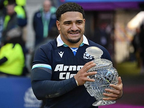 Scotland's centre Sione Tuipulotu collects the Hopetoun Cup after the Autumn Nations Series International rugby union test match against Australia at Murrayfield Stadium in Edinburgh on Sunday.