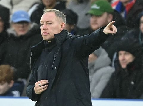 Leicester City's Welsh Manager Steve Cooper gestures on the touchline during the English Premier League football match against Chelsea at King Power Stadium in Leicester, central England on Saturday.