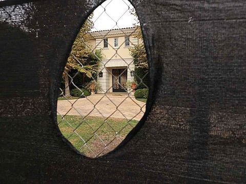 Outside the mansion where brothers Lyle and Erik Menendez murdered their parents in 1989 in Beverly Hills, California.