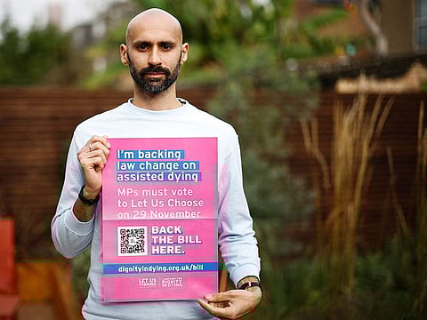 Anil Douglas, a campaigner in support of the assisted dying bill whose father suffered from multiple sclerosis and committed suicide, poses for a portrait in London.