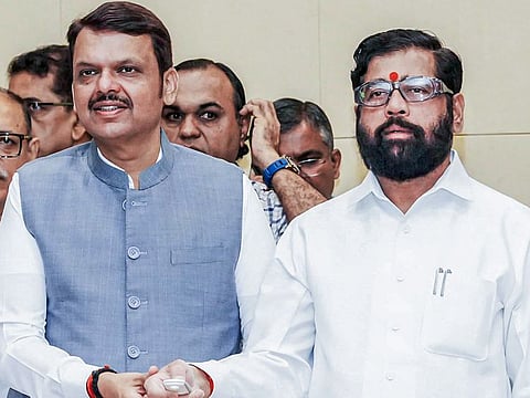 Eknath Shinde (R) with Devendra Fadnavis (L)